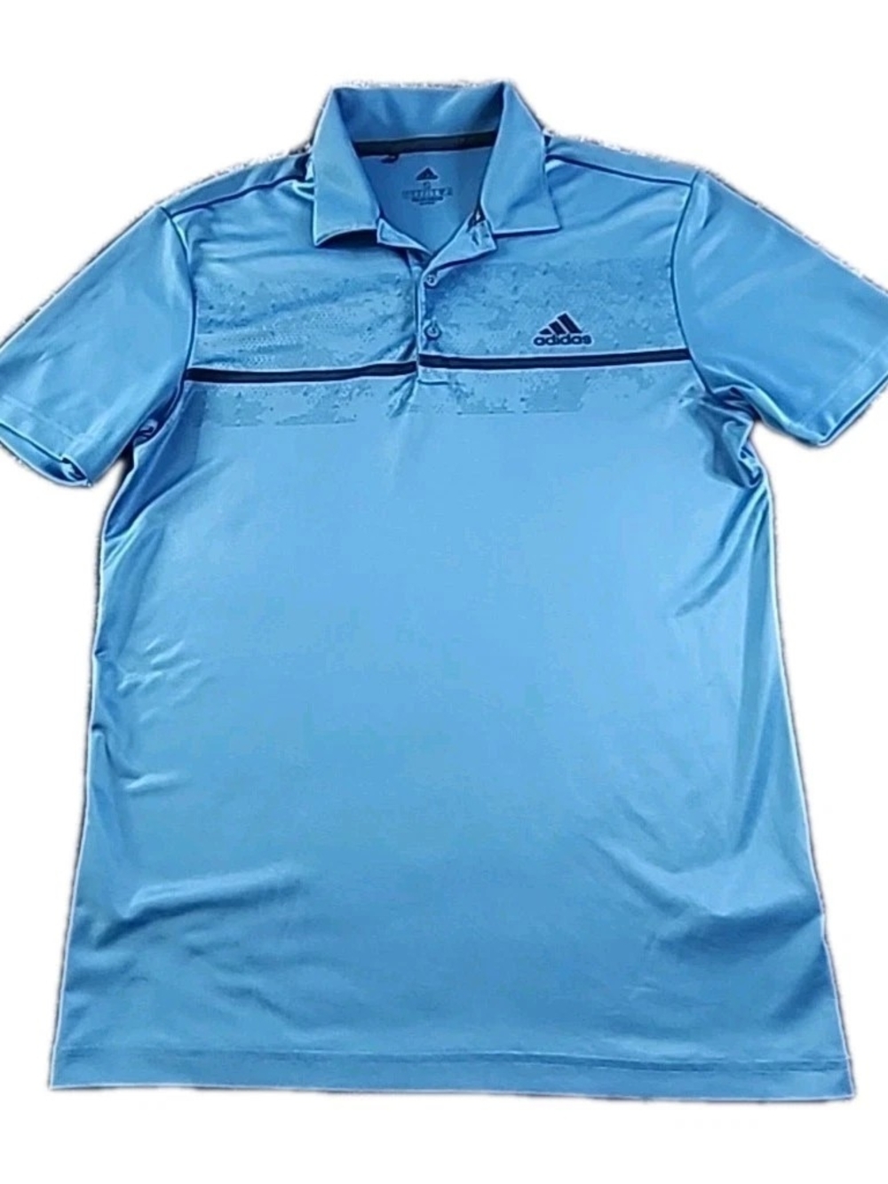 This ADIDAS Golf Polo Shirt is a stylish and comfortable choice for men looking
